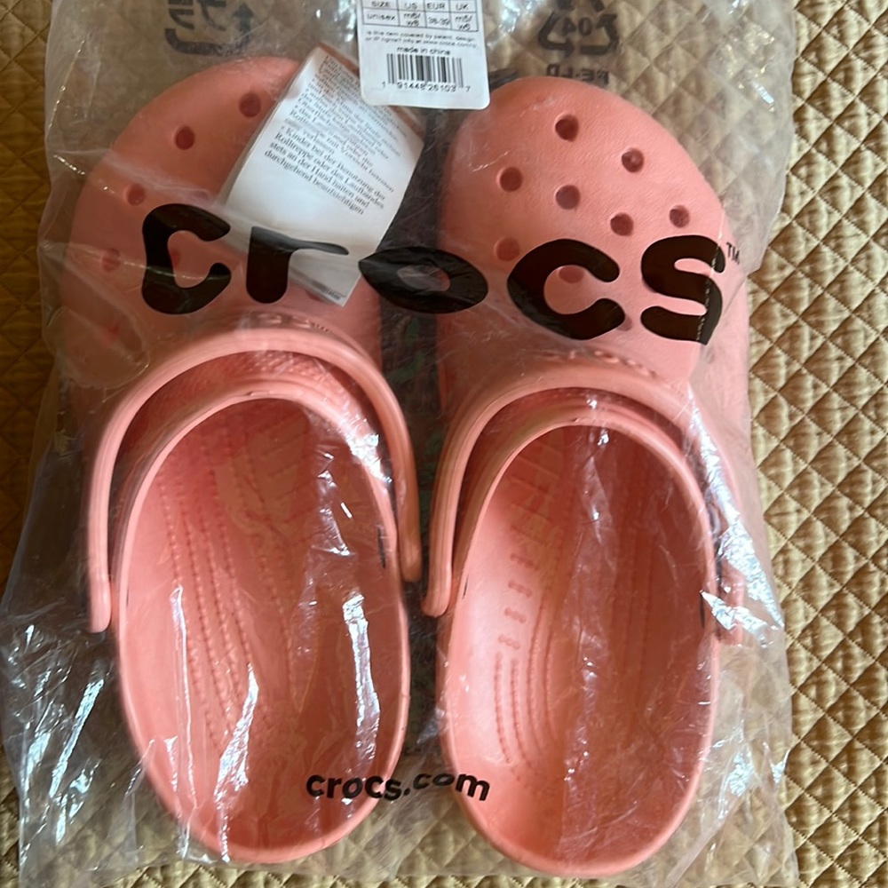 Crocs melon colored brand new.